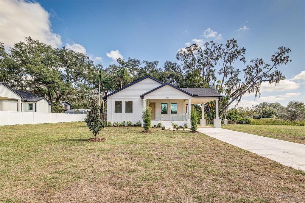 Photo of 7901 N Greenwood Avenue, Tampa, FL 33604 (MLS # O6443527)