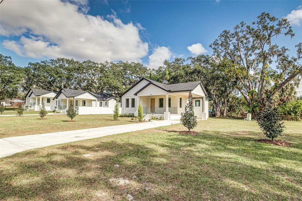 Photo of 7901 N Greenwood Avenue, Tampa, FL 33604 (MLS # O6443527)