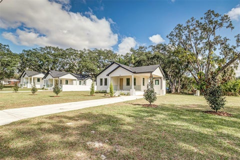 Photo of 7901 N Greenwood Avenue, Tampa, FL 33604 (MLS # O6443527)