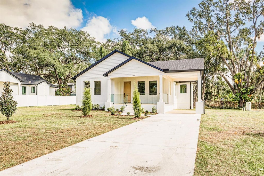 Photo of 7901 N Greenwood Avenue, Tampa, FL 33604 (MLS # O6443527)