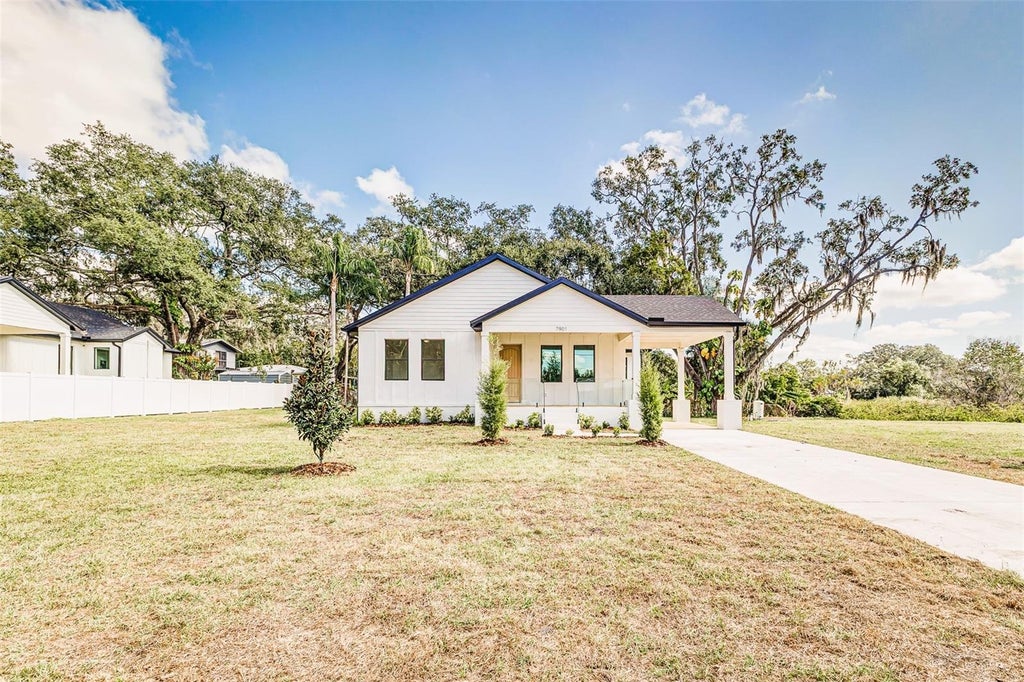 Photo of 7901 N Greenwood Avenue, Tampa, FL 33604 (MLS # O6443527)