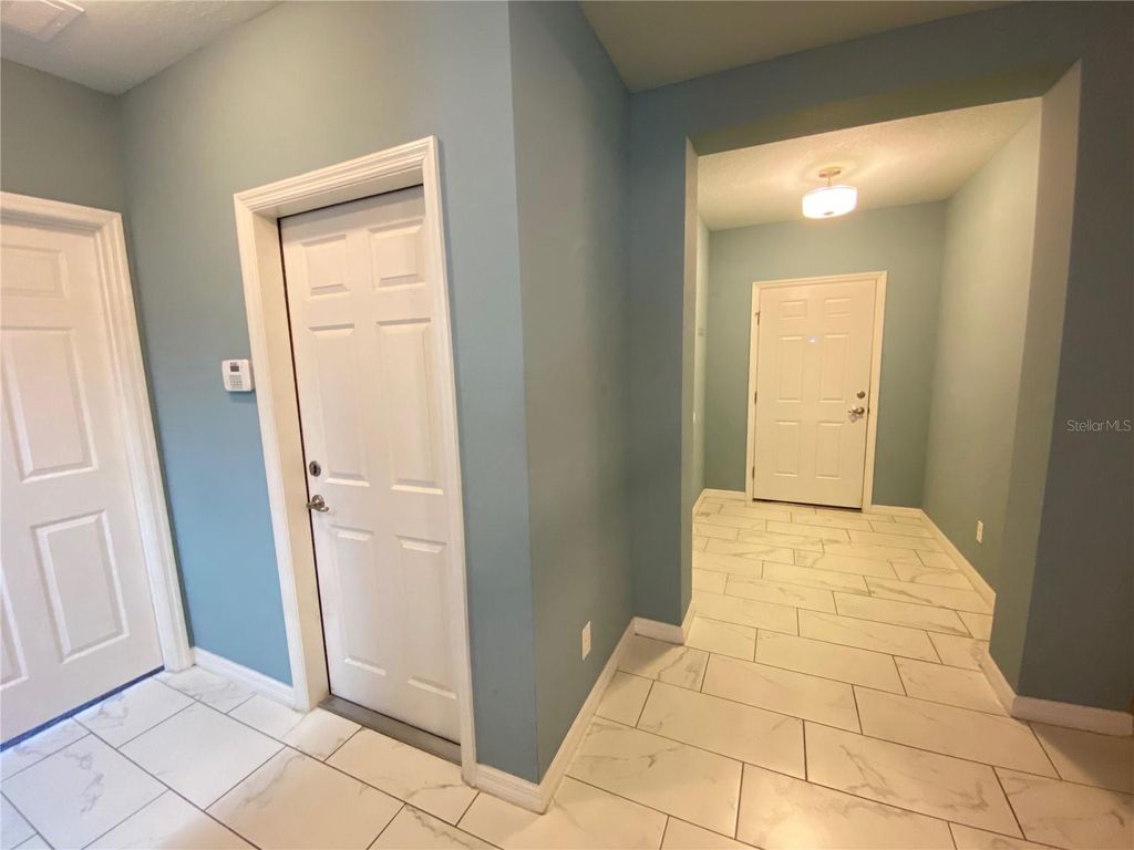 Photo of 231 Salamanca Road, Davenport, FL 33837 (MLS # O6405317)