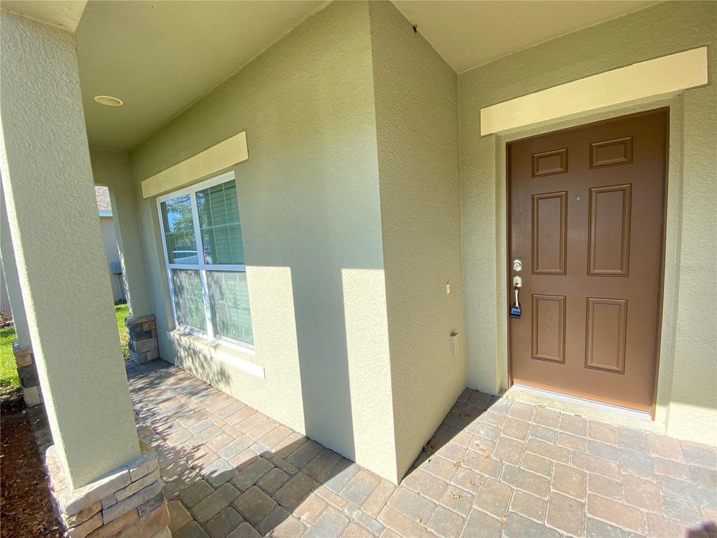 Photo of 231 Salamanca Road, Davenport, FL 33837 (MLS # O6405317)