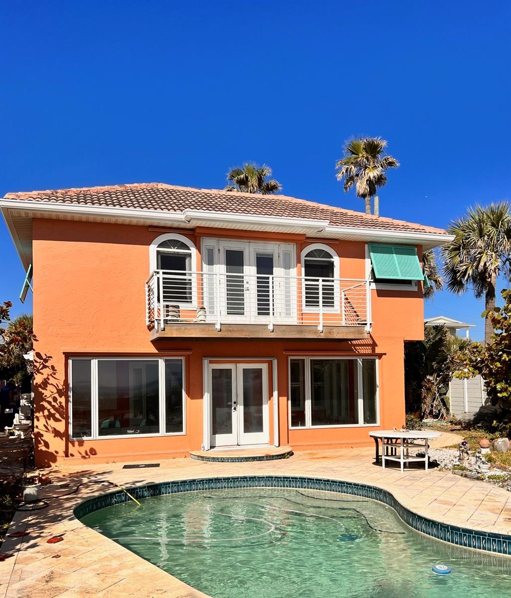 AMAZING direct oceanfront pool home with spectacular views of the ocean. This 3 bedroom 3 bath home is located in the Short Term Rental Zone, its the perfect beach home and has income potential. This beachside retreat offers 2 bedrooms and 2 bathrooms on the first floor with huge open living dining room and wood burning fireplace and just steps to the pool and beach. The second floor master suite has stunning views of the ocean, walk in closet and private balcony. The large kitchen and open living space, make it perfect for entertaining family and friends. The 2+ car garage allows plenty of storage space. This home is so close to shops and restaurants and all the NSB LIFESTYLE that anyone would want. ;Water: City