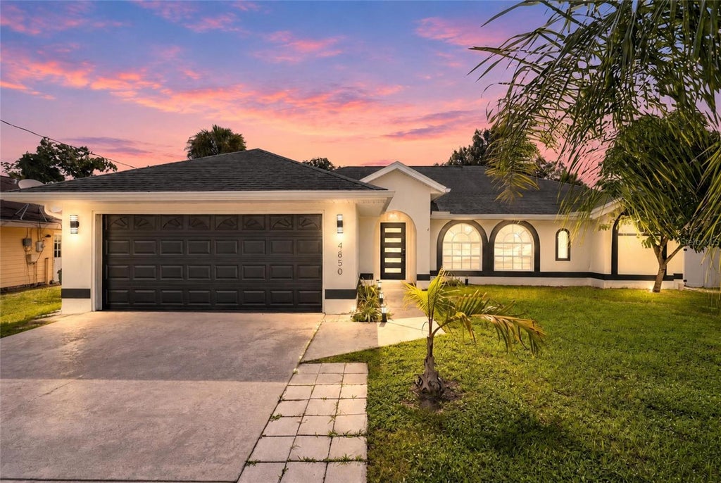 Photo of 4850 S Salford Boulevard, North Port, FL 34287 (MLS # TB8553033)