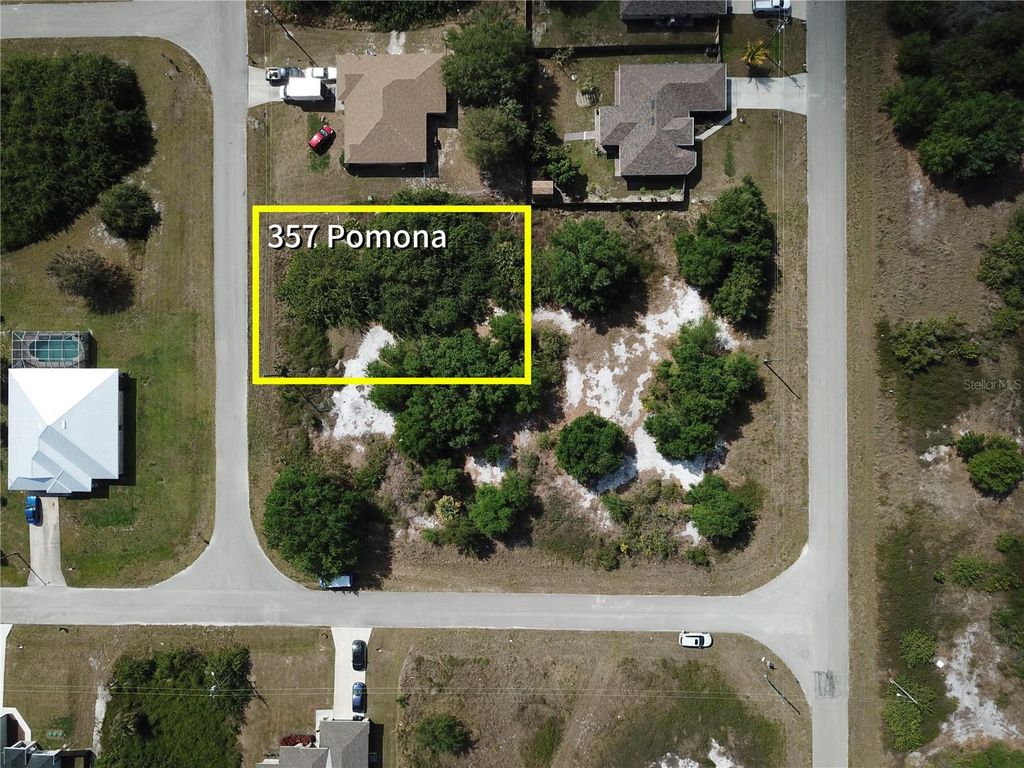 Photo of 357 Pomona Street, Lehigh Acres, FL 33974 (MLS # O6292485)