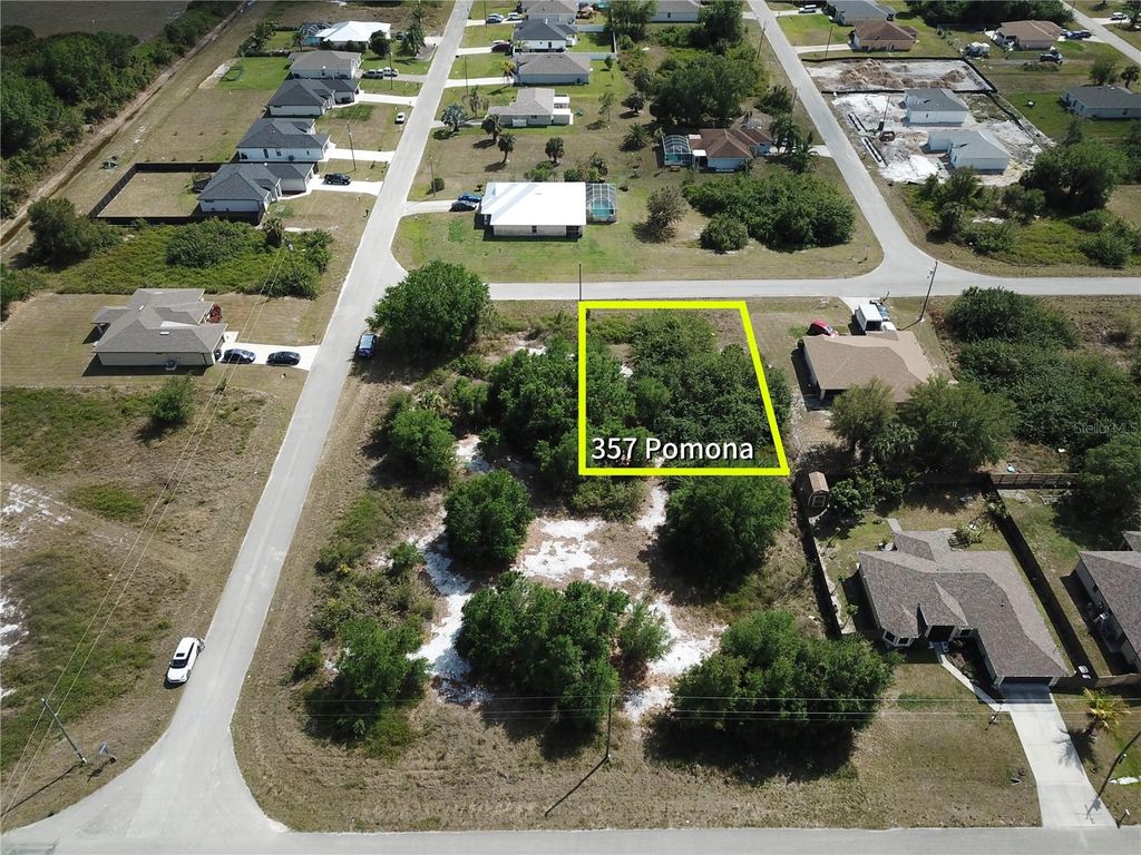 Photo of 357 Pomona Street, Lehigh Acres, FL 33974 (MLS # O6292485)
