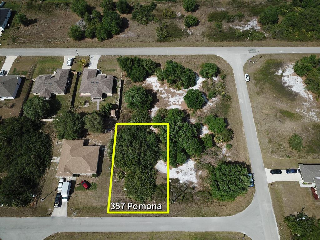 Photo of 357 Pomona Street, Lehigh Acres, FL 33974 (MLS # O6292485)