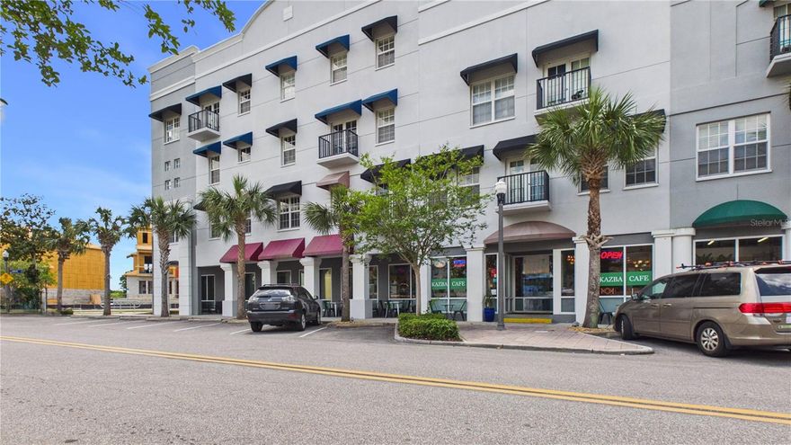 Top-floor. Two true en-suite bedrooms. Downtown Oldsmar at your doorstep. Welcome to Unit #324 at the Oldsmar Galleria — a move-in-ready, corner of Pinellas County where thoughtful updates, a smart layout, and a walkable lifestyle come together.

Step inside to an open floor plan dressed in fresh interior paint, brand-new carpet, and ceramic tile flowing through the main living spaces. The kitchen is built for real life — a welcoming breakfast bar for morning coffee or casual conversation, an appliance suite including refrigerator, dishwasher, built-in microwave, and disposal, and clean sightlines into the 20x13 living room that anchors the home. 

From your private balcony on the top floor — the third and highest level — take in mixed downtown views and the easy Florida breeze. The balcony functions as a true outdoor extension of the living area: a morning coffee perch, a sunset lounge, a quiet place to exhale at the end of the day.

And then there's the neighborhood. Downtown Oldsmar has quietly become one of the Bay Area's most charming small-town-feel destinations — walkable streets, R.E. Olds Park on the shoreline of Old Tampa Bay, Oldsmar library, the Farmers Market, local cafés and restaurants, and year-round community events that turn neighbors into friends. You're minutes from the Veterans Expressway, an easy drive to Tampa International, and well-positioned for Westshore commutes or a spontaneous Gulf beach day.