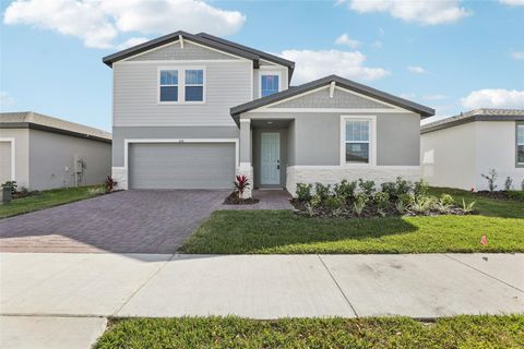 Photo of 878 Sand Sea Place, Haines City, FL 33844 (MLS # O6357761)