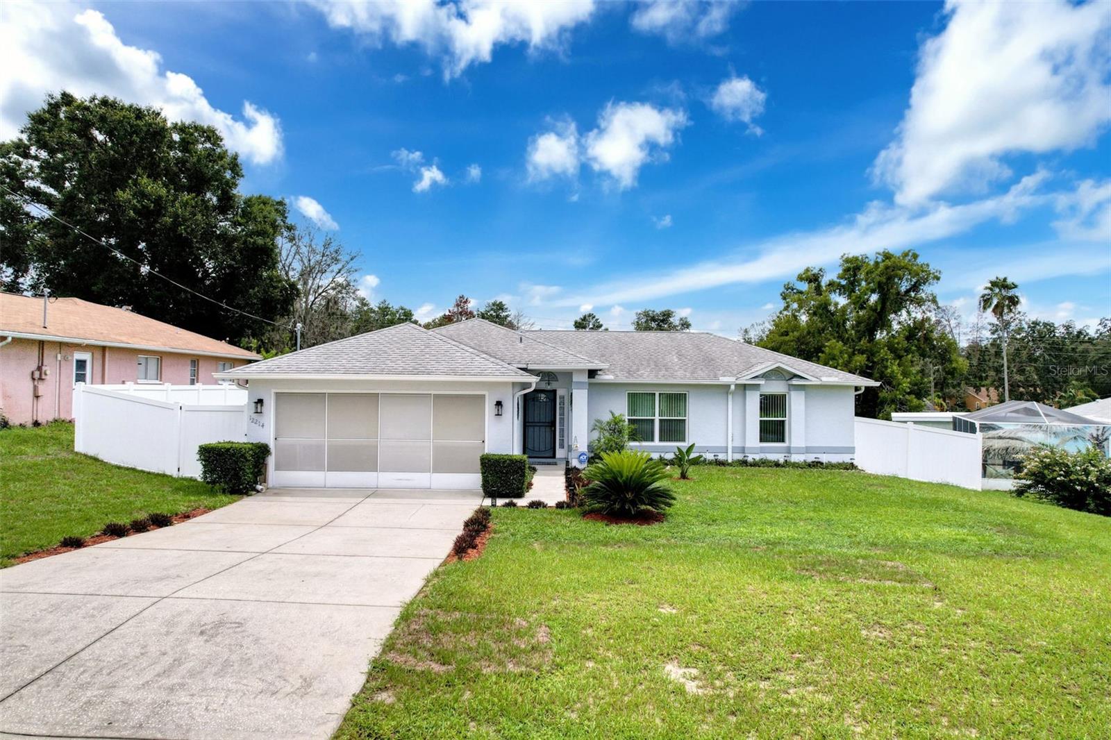 Completely Remodeled Pool Home in the Heart of Spring Hill - Welcome to your dream home! This stunningly renovated 3-bedroom, 2-bath pool home is ready for new owners. The sellers spared no expense transforming it into their “forever home,” but life had other plans—giving you the chance to call it yours. From the moment you step inside, you’ll appreciate the thoughtful design and high-end finishes throughout. The split floor plan provides ideal privacy for family or guests, while the open-concept living areas provides a spacious, airy feel—perfect for relaxing or entertaining. The gorgeous, completely remodeled kitchen is a true showstopper. It features granite countertops, solid wood cabinetry, modern stainless steel appliances, and a deep stainless farm sink perfectly situated in the space. Additional cabinetry and a recessed nook provide ample storage. Best of all, the kitchen opens directly to the living and dining areas, with a clear view of the sparkling pool. Retreat to the primary suite, where comfort and luxury await. You'll enjoy a walk-in closet and an ensuite bath with a fully tiled walk-in shower, dual mirrored built-in cabinets, and a stylish vanity with solid surface countertop and wood finishes—designed to help you unwind at the end of the day. Sliding glass doors lead directly to the freshly resurfaced pool, offering your own private oasis just steps from your bed. Throughout the home, you'll find luxury vinyl and ceramic tile flooring, vaulted ceilings, and strategically placed ceiling fans for a warm, welcoming ambiance. Additional upgrades include: Energy-efficient, low-UV replacement windows for improved comfort and lower electric bills. Fresh interior and exterior paint for a crisp, modern look and so much more!
The large back yard is fully fenced so your cuddly, furry family members will have plenty of room to run around and enjoy the Florida sunshine and warm breezes.. The roof was replaced in 2020. Conveniently located near Suncoast Parkway for an easy commute to Tampa or Crystal River, and just minutes from shopping, dining, schools, Weeki Wachee Springs, Pine Island, and so much more.
This home truly has it all—style, function, location, and a pool! Don’t miss out—schedule your private showing today before it’s gone!