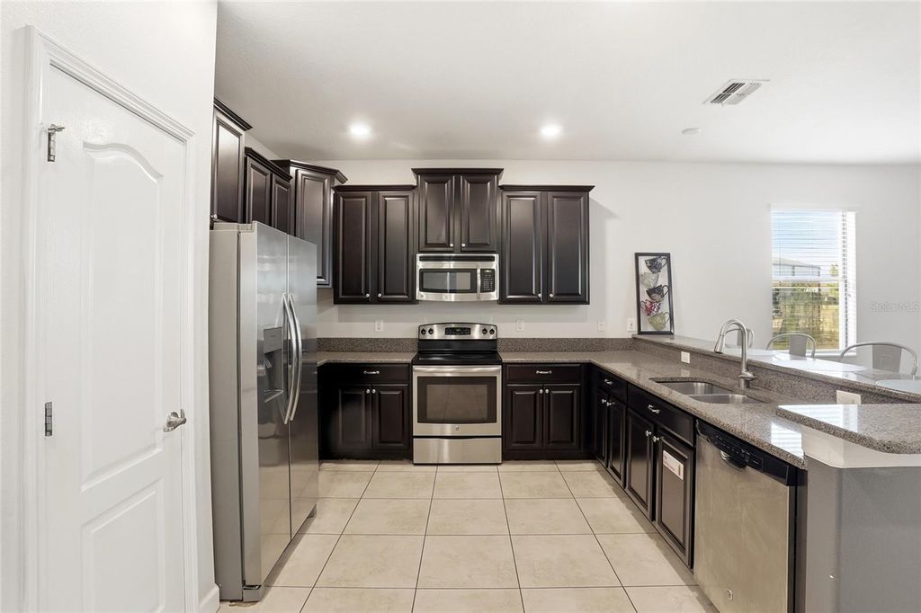 Photo of 9039 Shadow Mountain Street, Davenport, FL 33896 (MLS # O6379163)