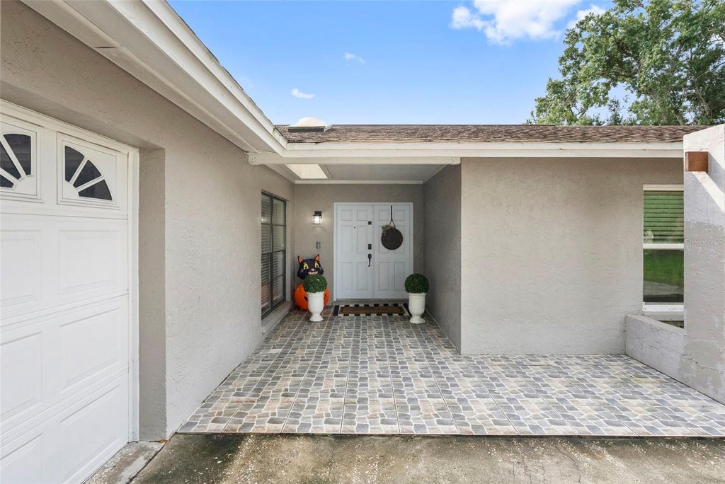Photo of 4010 Braesgate Lane, Tampa, FL 33624 (MLS # TB8551808)