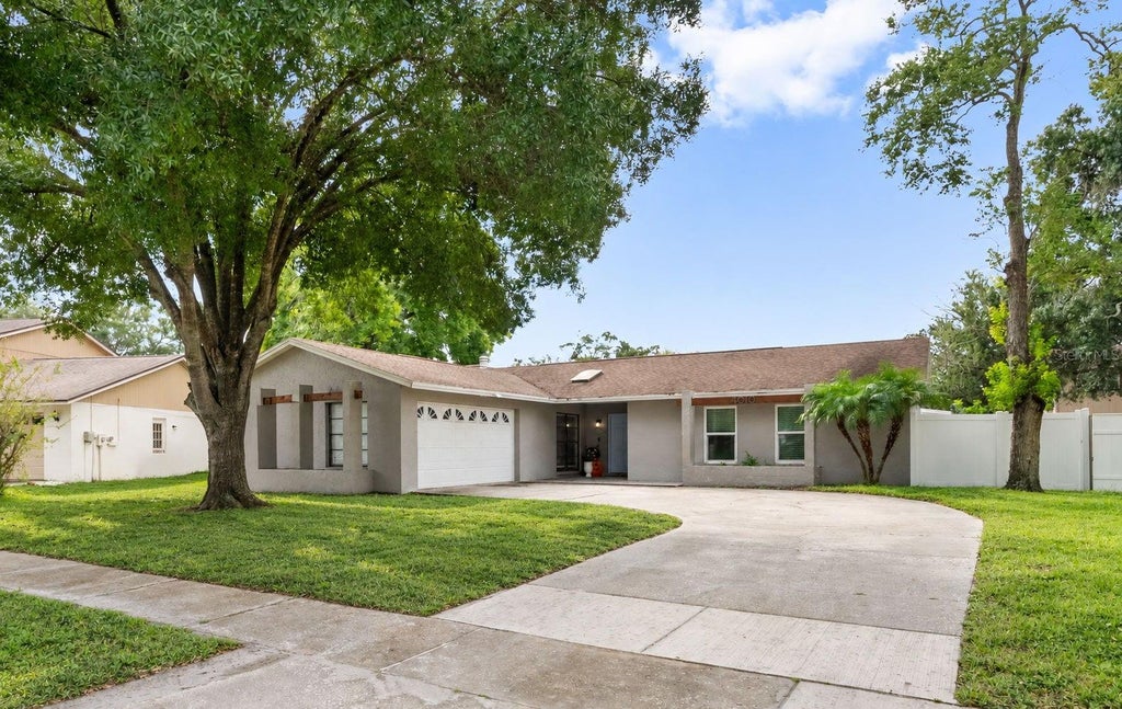 Photo of 4010 Braesgate Lane, Tampa, FL 33624 (MLS # TB8551808)