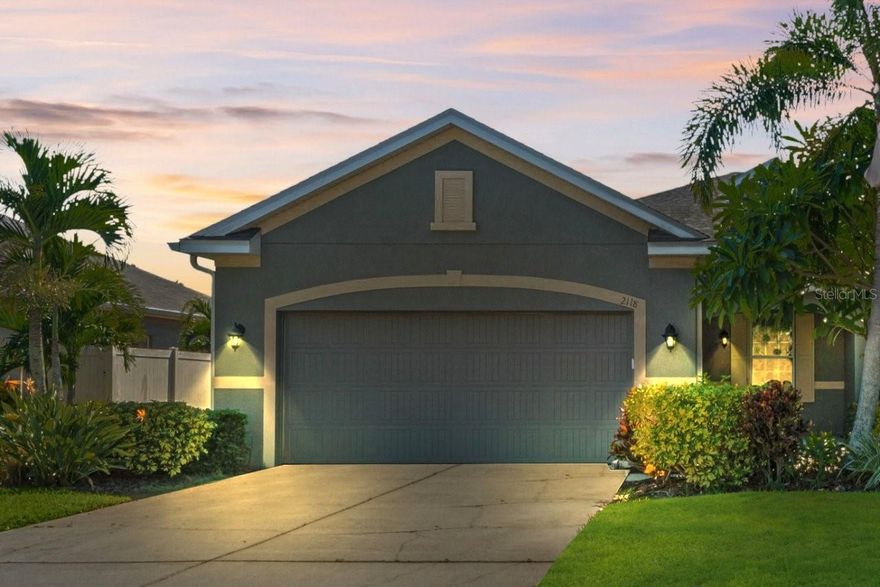 One or more photo(s) has been virtually staged. Welcome to the carefree lifestyle in Gulfwinds Villas!  This beautiful three bedroom two bath two car garage villa has been meticulously cared for and is ready for a new owner.  As you walk through the front door, you will be greeted by the light and spacious open concept interior.  They say the kitchen is the heart of the home, and you will love the flow and openness as this is a RARE true Island layout which opens the space even more.  The stainless steel appliances and granite counters enhance the functionality, and allow you to interact with your guests as you prepare your gourmet meals.  The flow into the dining area and family room feels open and spacious.  The primary bedroom will easily accommodate a king size bed, and your spa like primary bathroom is complete with soaking tub, shower, dual vanities, and walk in closet.  The two additional bedrooms will easily handle your guests while visiting.  the large screened in porch gives you additional entertaining space for those barbecues you will be sure to have.  Enjoy the community spa like pool area, or take your dog for a walk in the park in the included green spaces.  Super close to Anclote River Park, and the world famous Sponge Docks with all of the fantastic restaurants and shops, you will wonder why you didn't move here before!  No flood insurance required.  Do not miss this rare opportunity for carefree Florida lifestyle. Make your appointment to see this stunning Villa today!