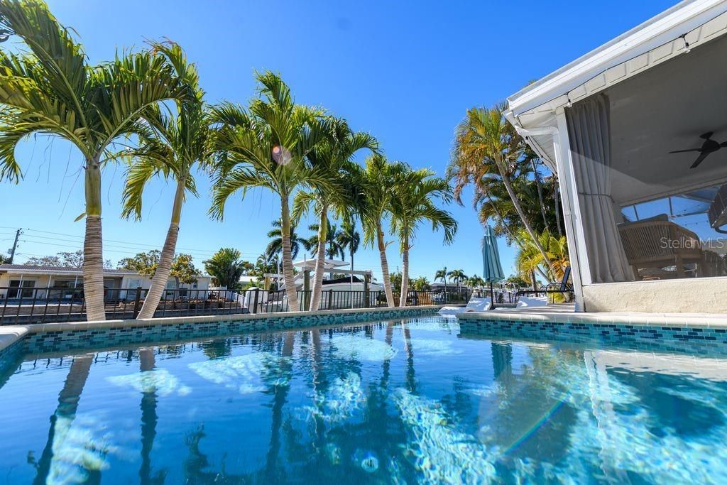 Photo of 1472 47th Avenue NE, St Petersburg, FL 33703 (MLS # O6382918)