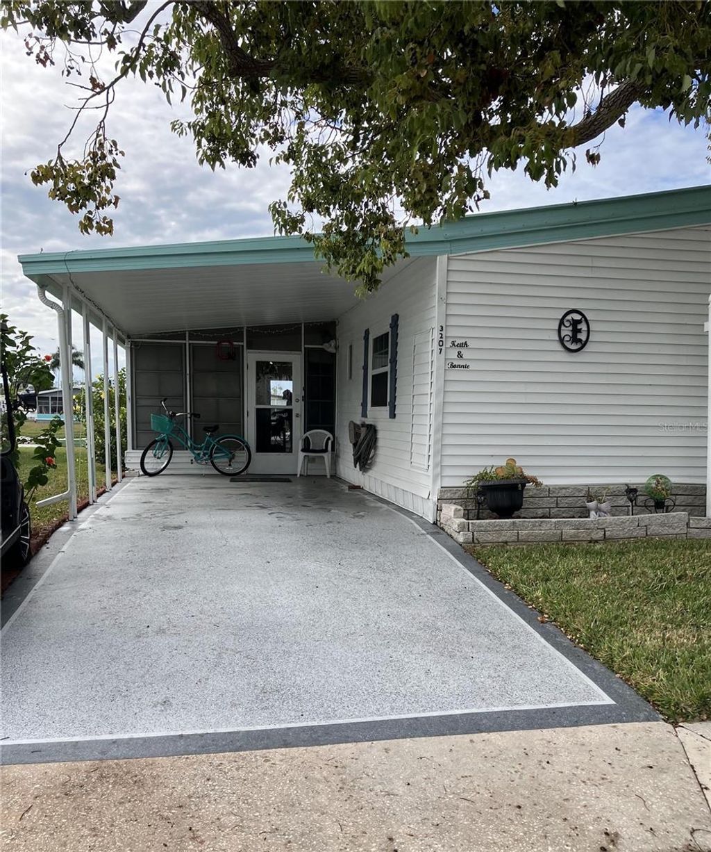 Photo of 3207 Brewster Drive, Holiday, FL 34690 (MLS # TB8444939)