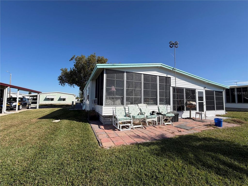 Photo of 3207 Brewster Drive, Holiday, FL 34690 (MLS # TB8444939)