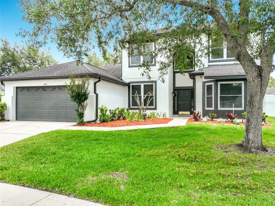 One or more photo(s) has been virtually staged. Perfectly positioned on a quiet cul-de-sac in the highly desirable Carillon community, this beautifully updated pool home in Oviedo combines timeless style with a functional layout designed for modern living. This spacious 4-bedroom home with an office and loft features a highly desirable floor plan, with the primary suite conveniently located on the main level. The primary suite includes an updated bathroom with modern finishes, including quartz countertops and thoughtful design. Inside, you’ll find a dedicated home office and an expansive upstairs loft—ideal for a media room, play area, or additional living space, with the option to convert it into a fifth bedroom. The secondary bedrooms are generously sized, and the updated upstairs bath features quartz countertops and stylish finishes. The kitchen is both functional and inviting, featuring desirable white cabinetry, granite countertops, a farmhouse sink, new faucets, and a high-end range that will impress any home chef.
Recent updates include fresh exterior paint, interior paint in select areas, and new flooring in the foyer and dining room, along with double-pane windows for energy efficiency. Step outside to enjoy your private backyard oasis, complete with an inviting screened-in pool, a large fenced yard, and plenty of space for entertaining or relaxing. Residents enjoy access to parks, tennis courts, and a ball field. Two top-rated schools are within walking distance. Commuters will appreciate the proximity to major employers, including Siemens, UCF, Lockheed Martin, and Research Park.Don’t miss your chance to own this move-in-ready home in one of Oviedo’s most sought-after locations—schedule your private showing today before it’s gone. Seller is providing a one year home warranty for peace of mind for one year.