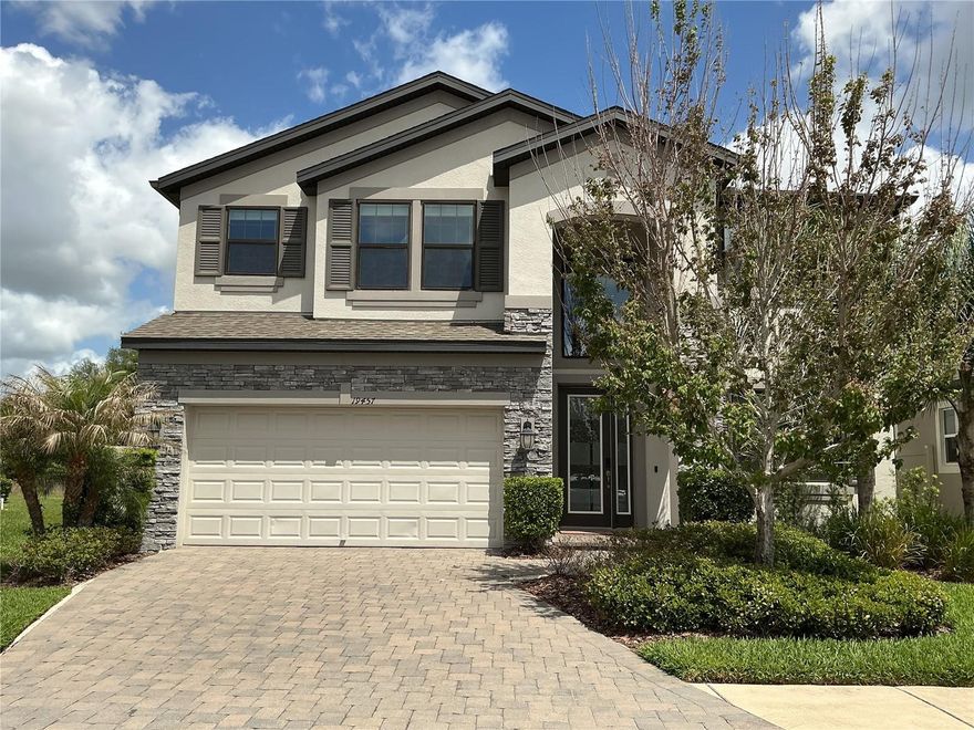 Discover exceptional space and style in this impressive 5-bedroom, 3-bath pool home offering over 3,600 sq ft of thoughtfully designed living. The heart of the home is a stunning chef-inspired kitchen featuring quartz countertops, upgraded 42-inch cabinetry, and generous prep and storage space. Multiple living and dining areas provide flexibility for entertaining, working, or relaxing. The expansive primary suite includes a private balcony, perfect for enjoying quiet mornings or evening breezes. 3 additional bedrooms on the upper level and 1 guest bedroom on main level with a full bath.  A large game area upstairs and  A rare 3-car tandem garage adds valuable storage and parking options. With its spacious layout and premium finishes, this home delivers comfort, elegance, and room to grow.