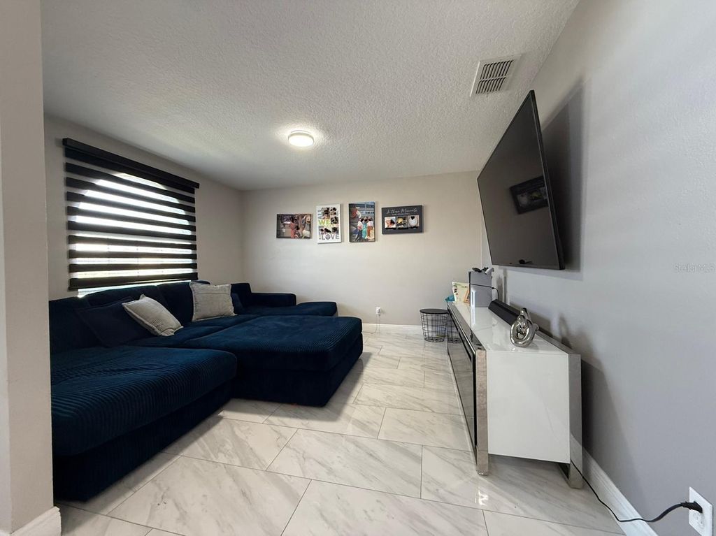 Photo of 4706 Doral Pointe Drive, Kissimmee, FL 34758 (MLS # O6352252)