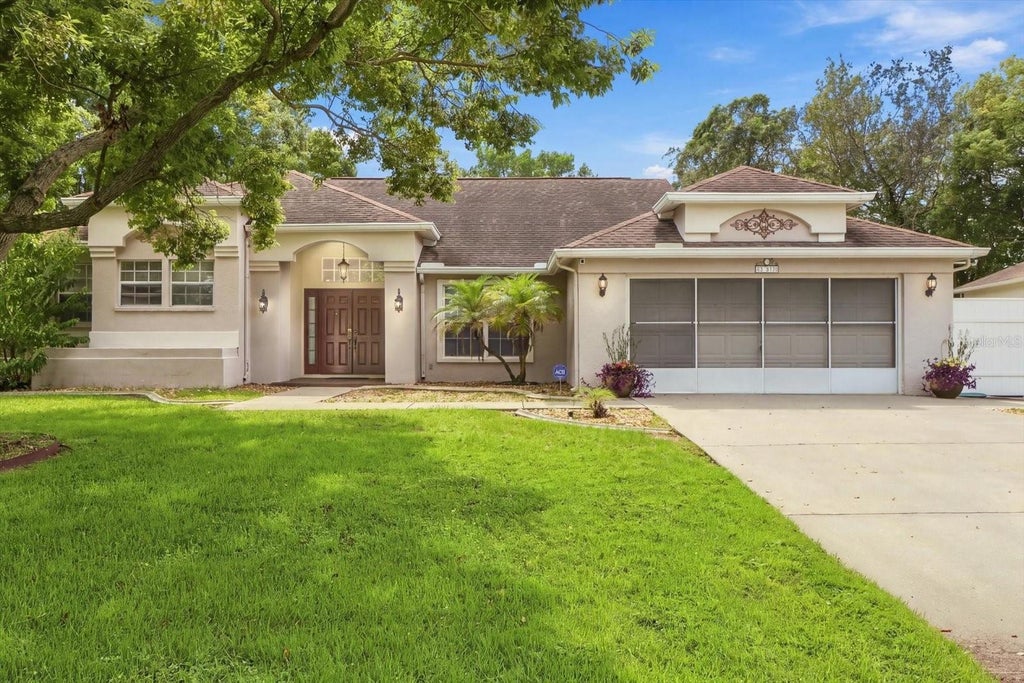 Photo of 8088 Spanish Oak Drive, Spring Hill, FL 34606 (MLS # W7889688)