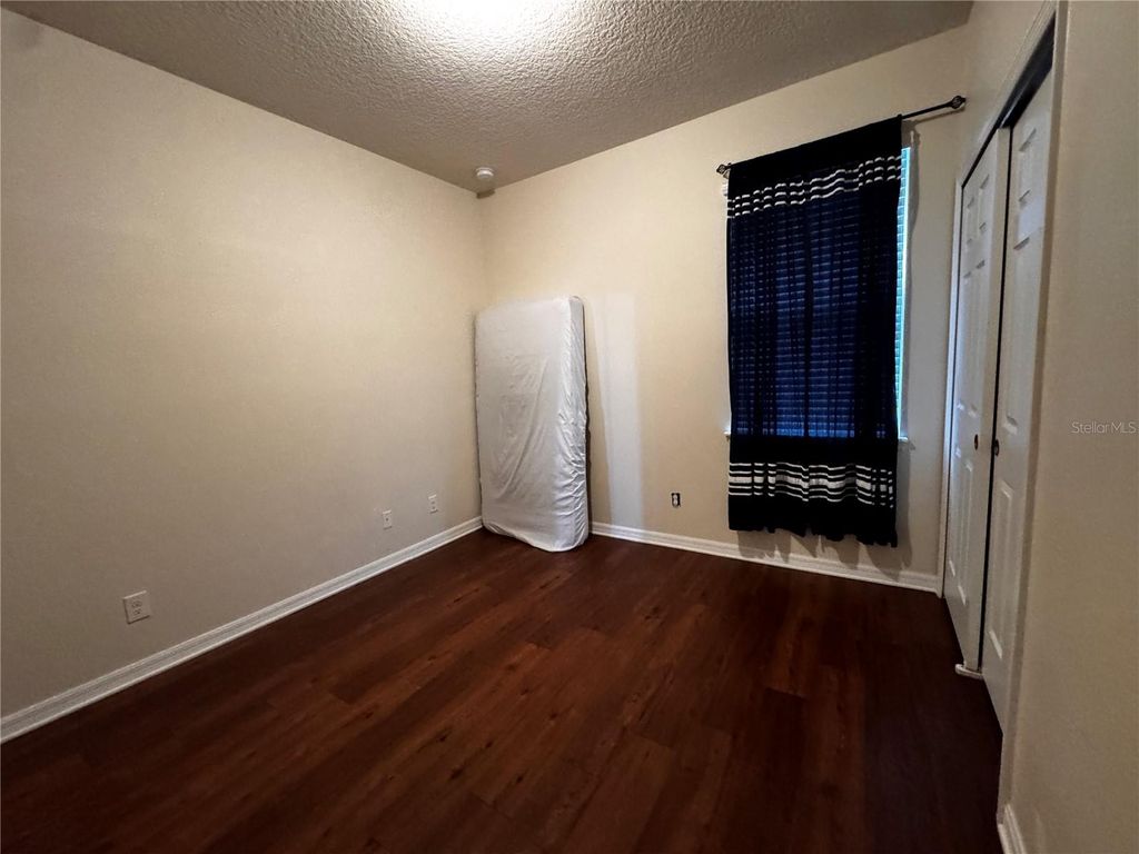 Photo of 4976 Millennia Green Drive, Orlando, FL 32811 (MLS # O6367617)