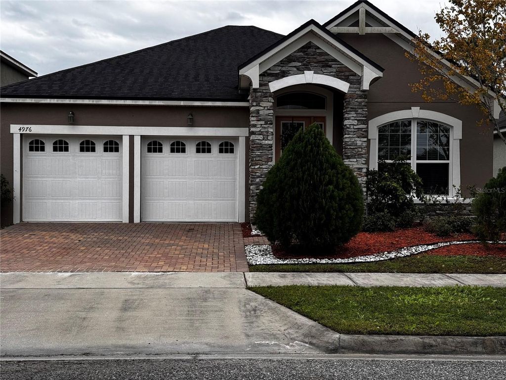 Photo of 4976 Millennia Green Drive, Orlando, FL 32811 (MLS # O6367617)