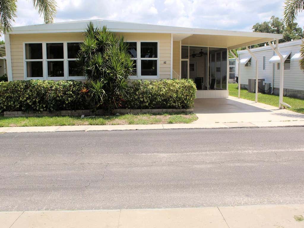 Photo of 92 Thatch Palm Street E, Largo, FL 33770 (MLS # TB8537254)