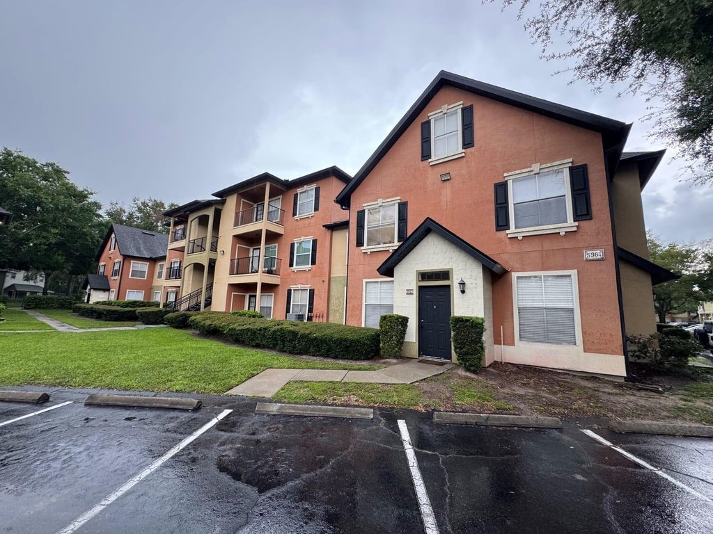 Photo of 5961 Westgate Drive #2013, Orlando, FL 32835 (MLS # O6444365)