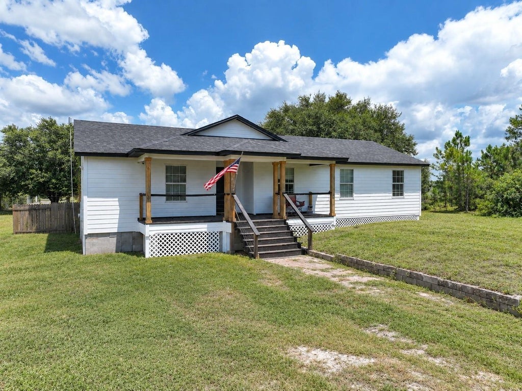 Photo of 1416 Wells Avenue, Lehigh Acres, FL 33972 (MLS # L4965579)
