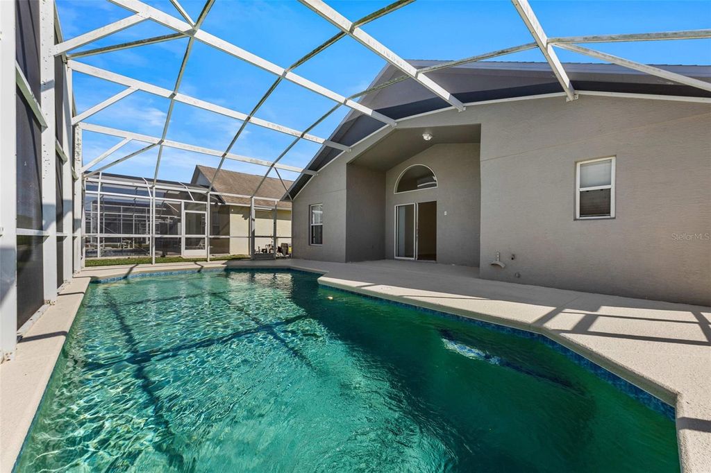 Photo of 123 Fox Loop, Davenport, FL 33837 (MLS # O6392061)