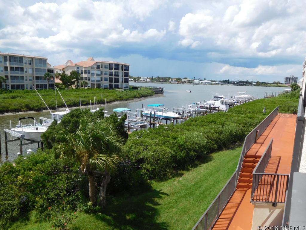 Boaters Paradise! Great looking 2BR/2BA furnished condo with deeded deep water dock! And, you can rent out the condo and use the slip for your boat! Fantastic views of the river & sunsets, pelicans, dolphins & boating action from this immaculate & move in ready condo. Tastefully remodeled & completely furnished, ready to enjoy fishing, relaxing or walking to shops, restaurants & the beach. Your private deeded boat slip with lift, #25, 10x24, is included with this 2BR/2BA condo on 2nd floor at Marker 33. Additional pilings can be added to boat slip for larger boat if needed. Newer 1st class kitchen has granite counters, maple cabinets & SS appliances! Tiled floors in living areas & berber carpet in Br's. Two small pets are allowed. Electric & water are provided at the docks which were renovated in 2006 along with the entire exterior of these condominiums. The complete renovation included painting, railings, balconies, lighting, paving, clubhouse w/kitchen, landscaping & attractive pavers on the pool deck & walkways. New roof in 2017 due to damage from Matthew. Also included with this condo is one assigned underground parking space just under your condo! Beautiful clubhouse with kitchen & pool table overlooks the sparkling pool & spa! Short walk to the beach and to Historic Canal St. & Flagler Avenue shops, restaurants & bistros. Only 2 miles by boat to Ponce Inlet & the Atlantic Ocean! Also, just minutes to Mosquito Lagoon & Canaveral National Seashore, some of the best fishing in the country! Live the life you deserve today! ;LocationDescription: Condo ;Water: City