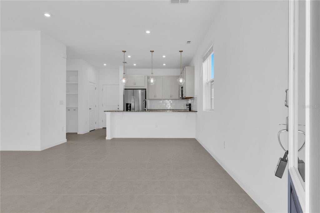 Photo of 9656 Peace Drive, Orlando, FL 32832 (MLS # O6449946)