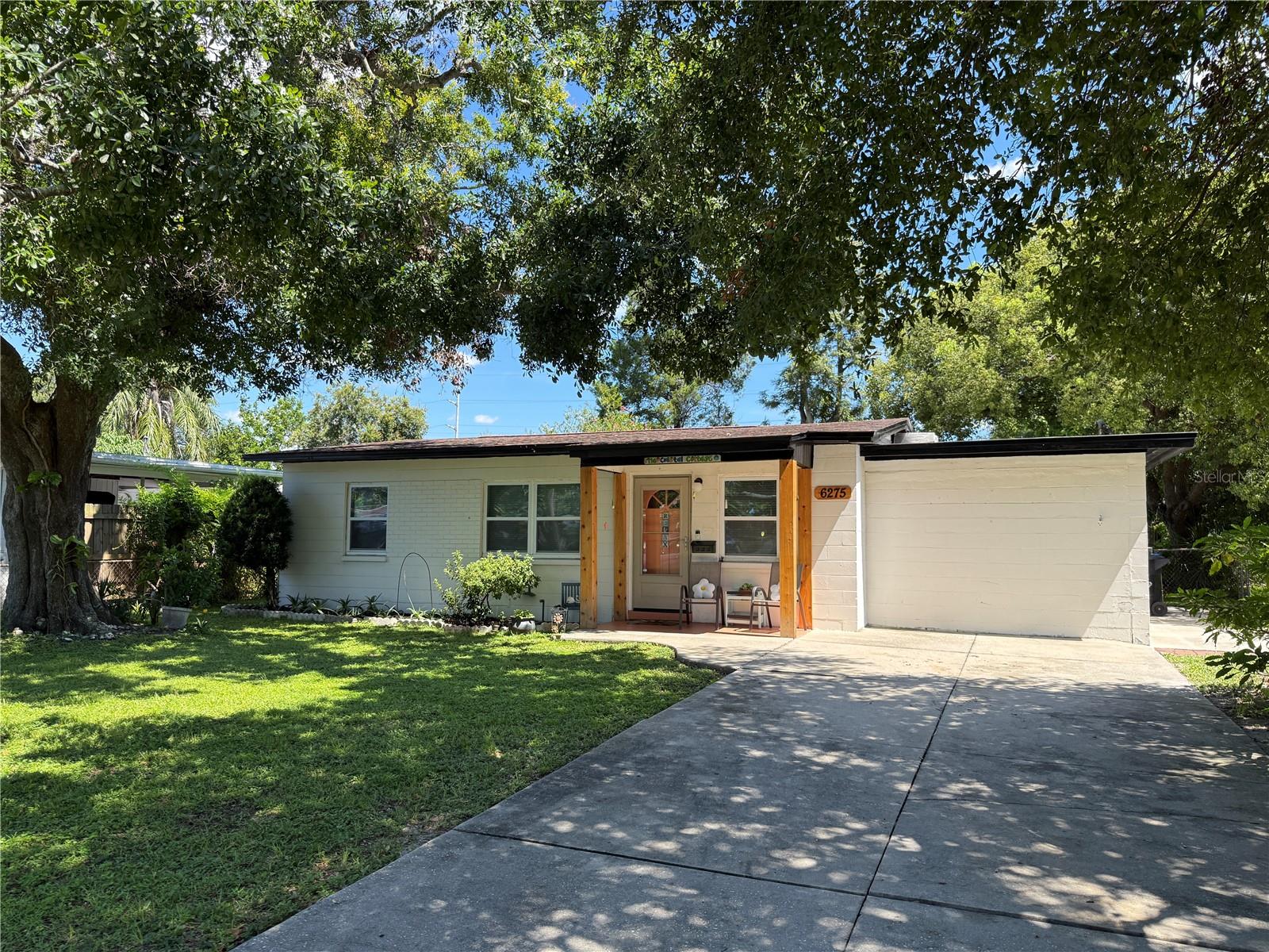Welcome to this beautifully 3-bedroom, 2-bathroom block home situated in the highly desirable Miles Pine neighborhood in Central St. Petersburg. Set on a spacious 60 x 125 ft lot, this property offers a perfect blend of modern upgrades and classic charm. Inside, you’ll find a freshly painted interior, brand-new carpet in all bedrooms, and a fully renovated kitchen featuring marble countertops, new cabinetry, and updated appliances. Other notable updates include: New interior doors throughout, stylish cedar porch pillars, new washer and dryer, 2021 A/C system, upgraded HVAC storage, drainage, and air filtration system, Ring doorbell included and paid through December 2025. Enjoy peace of mind in a non-flood zone—no flood insurance required, and no flooding reported during hurricanes Helene or Milton. Outside, the fully fenced backyard offers ample space to add a pool, garden, or simply relax and entertain. Whether you're a first-time homebuyer, downsizing, or seeking an investment property, this home offers excellent value and potential. This prime location is minutes to St Pete General Hospital, close to top-rated dining like Casita Taqueria, Kobe Steakhouse and Twistee Treat, near Tyrone Mall shopping. Just 5 miles to beautiful white sand beaches, 20 minutes to downtown St. Pete, and 30 minutes to Tampa International Airport. Don't miss this opportunity to own a move-in ready home in one of St. Pete’s most convenient and charming neighborhoods!
