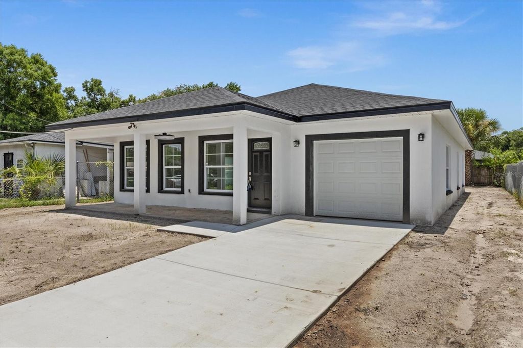 Photo of 2015 E Seward Street, Tampa, FL 33604 (MLS # TB8503568)