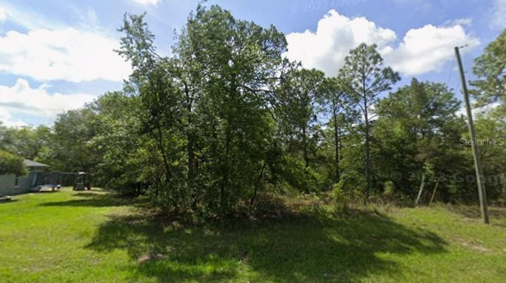 Photo of 5709 N Decarlo Drive, Citrus Springs, FL 34434 (MLS # OM715940)