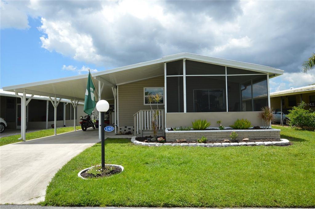 Photo of 140 Rarotonga Road, North Port, FL 34287 (MLS # C7513736)