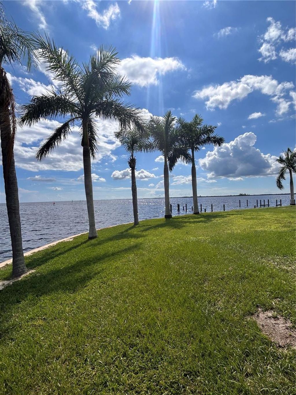 Photo of 143 Creek Drive SE, Port Charlotte, FL 33952 (MLS # O6146270)