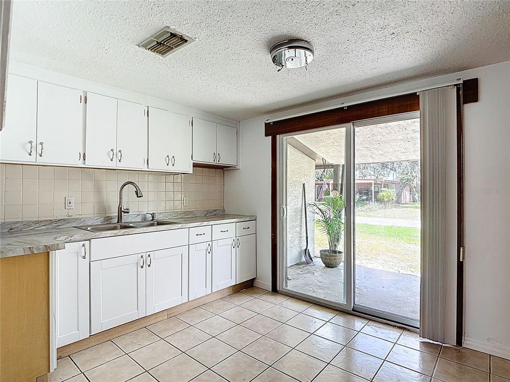 Photo of 14709 Fair Oak Way, Hudson, FL 34667 (MLS # W7878317)
