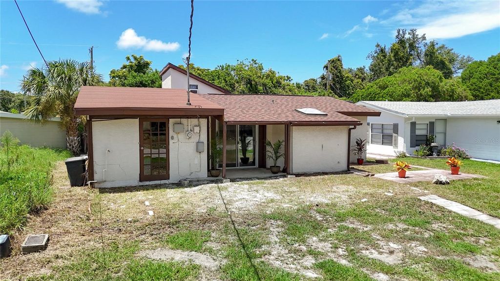 Photo of 14709 Fair Oak Way, Hudson, FL 34667 (MLS # W7878317)