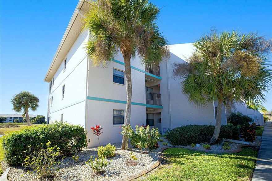 Welcome to easy Southwest Florida living at 175 Kings Highway, Unit 1131, Punta Gorda, FL 33983. This TURN-KEY FURNISHED, 3rd floor      END-UNIT condominium offers 2 bedrooms and 2 full bathrooms with a split-bedroom floor plan, ideal for privacy and guest accommodations.  Designed for comfort and functionality, the residence features TILE FLOORING throughout, coastal-style furnishings, and abundant natural light. The open dining area includes a built-in WET BAR, creating an inviting space for hosting and entertaining. Step onto the screened lanai and enjoy tranquil pond views from two exposures, perfect for morning coffee or evening relaxation.  Additional highlights include ELEVATOR access, COVERED CARPORT parking, and a newer HVAC system (2023) for energy efficiency and year-round climate control. This pet-friendly condominium community offers a large HEATED SWIMMING POOL, professionally maintained landscaping.  HOA fees cover water, sewer, and trash services.  Centrally positioned near US-41, I-75, and just minutes from golf courses, shopping centers, restaurants, medical facilities, and Punta Gorda Airport, this property is well-suited for a seasonal Florida residence, full-time living, or income-producing investment.  MOVE-IN READY condo for sale in Punta Gorda, Florida—schedule a private showing and secure your place in one of Southwest Florida’s most convenient and sought-after locations.