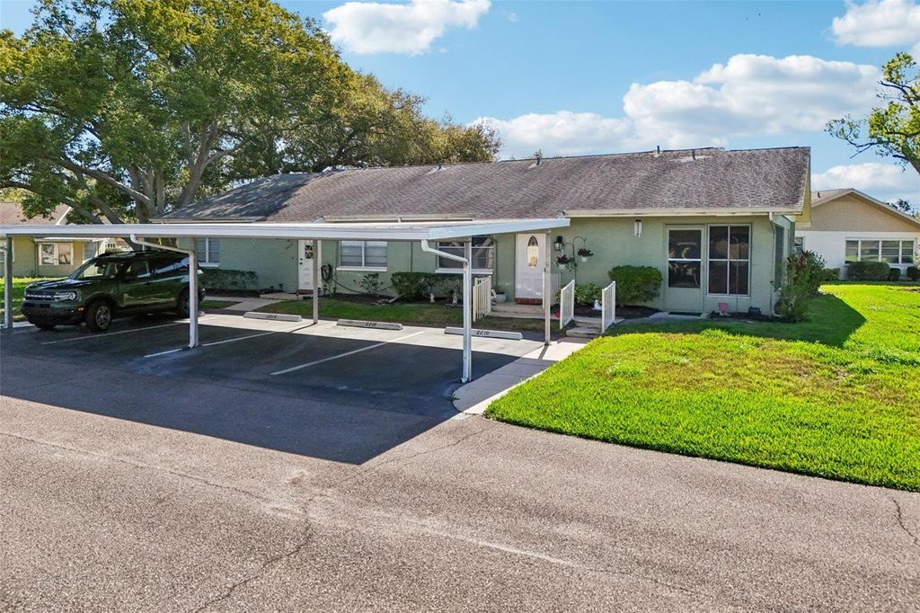 Photo of 2216 Grenadier Drive, Sun City Center, FL 33573 (MLS # TB8483867)