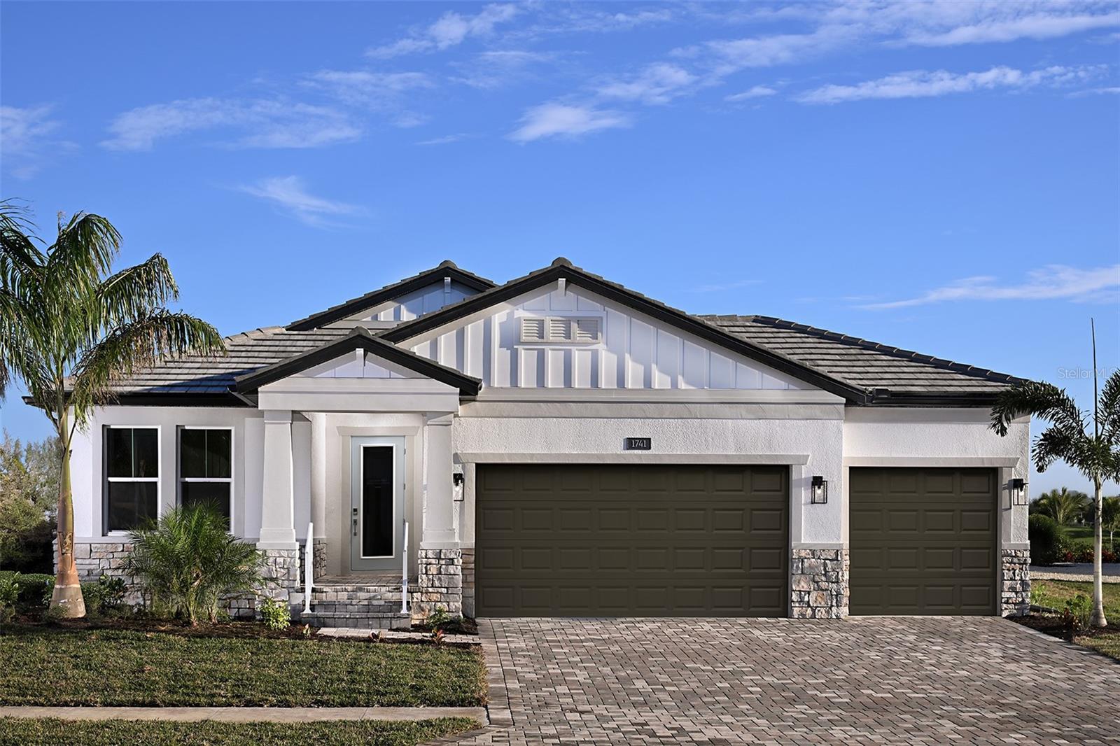 MODEL LEASEBACK OPPORTUNITY! Welcome home to the Calusa model home at Cassata Lakes with a pond view! With 4 bedrooms and 3 bathrooms, this POOL home is truly a sight to behold. Come take a look inside! This beautifully designed single-story home offers 2,195 square feet of well-appointed living space, featuring 4 bedrooms, 3 full bathrooms, and a 3-car garage with a 4-foot extension, providing ample storage and parking options. Perfectly blending style and functionality, this home is ideal for families and entertainers alike. As you enter, the inviting foyer greets you with an elegant tray ceiling, setting the tone for the rest of the home. The open-concept design seamlessly connects the kitchen, café, and great room, creating a spacious and cohesive living area. The kitchen features modern appliances, ample cabinetry, and a large center island with quartz countertops that’s perfect for meal preparation or casual dining. The owner’s suite offers a luxurious retreat with a tray ceiling, a spacious walk-in closet, and a deluxe bathroom complete with a soaking tub, a separate walk-in shower, and dual vanities. The additional bedrooms are generously sized and situated near two full bathrooms, providing comfort and convenience for family or guests. Step outside to the expansive extended 27' x 14' lanai, an outdoor oasis featuring a built-in outdoor kitchen and a pool, perfect for relaxation and entertaining. Whether hosting a barbecue or enjoying a quiet evening swim, this space enhances your outdoor living experience. With thoughtful design and luxurious touches, this home offers everything you need for modern living.