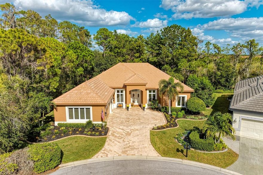 A Touch of Class…this star-studded home delivers! A rare opportunity to own a home within the elite enclave of the North Bridge subcommunity in Rosedale Golf & Country Club. This gorgeous 3 bedroom, 3 full bath, 2,573 sq. ft. home has it all! Situated on a private ½ acre preserve lot. The Sterling great room floor plan offers luxurious Florida living with a formal dining room, separate office/den, completely remodeled gourmet kitchen with café eat-in space, each bedroom with its very own ensuite bath. Impressive, high-quality improvements have been completed. They include New Roof 2023, New A/C 2021 w/transferable warranty, New Hot Water Heater 2019, Whole house water filtration R/O system, Complete Kitchen, and Bathroom remodels! High-end appliances and wine bar, new designer lighting, chandeliers, fans throughout, custom made draperies in most rooms, installed new wood flooring, freshly painted interior, exterior paint 2023, 2021 newly installed outdoor expanded lanai w/picture frame enclosure, new paver brick flooring with comfortable heaters and fans. The outdoor landscape has completely transformed with decorative curbing, accent and up lighting throughout the entire yard and gardens, magnificent water fountain, new backyard fencing with a mosquito misting system in place. The 2+ oversized garage with golf cart space has additional built-in storage cabinetry, new epoxy flooring and workspace. There is So Much More to Mention about this special home, this is a Truly Must See! Whether you're seeking an active or a more relaxed environment, Rosedale has something to offer each member of its community. With the appealing Social Membership to the Rosedale Golf & Country Club, you can enjoy amenities such as lighted Har-Tru tennis courts, bocce courts, and a 22,000 square foot clubhouse with a heated junior-size Olympic swimming pool, the recently upgraded fitness center features Peloton Bikes and mirror exercise equipment, daily workout classes and access to personal trainers. The Clubhouse features a full-service restaurant that hosts numerous social events and activities throughout the year. For the avid golfer, Rosedale Golf and Country Club offers various levels of golf memberships. HOA fees conveniently include cable & internet, landscaping, 24/7 manned gates, and dog parks. Rosedale is a meticulously maintained community conveniently located just east of I-75 between SR-70 and SR-64 centrally located to restaurants, UTC mall, the airport, great schools, and some of the best beaches in the country! Call for your preview today, this one will not last! P.S. No Mandatory Membership here and No CDD Fees!