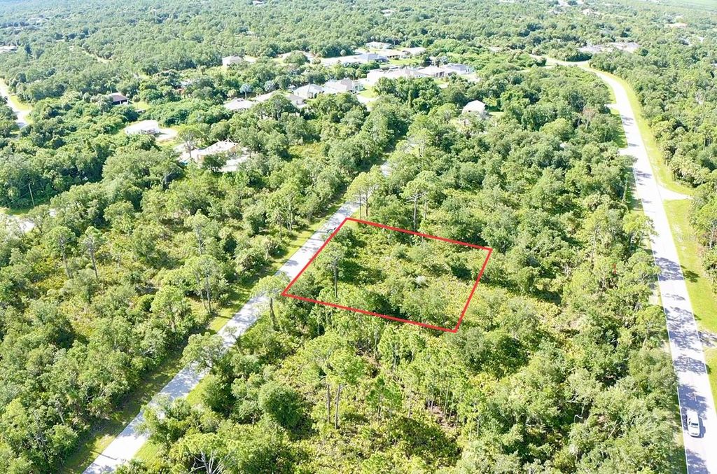 Photo of 3113 Calexico Street, Port Charlotte, FL 33948 (MLS # C7512809)