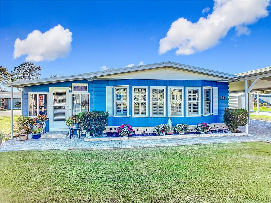 Photo of 812 Swallow Lane #M142, Osteen, FL 32764 (MLS # O6374984)