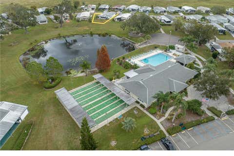 Photo of 6114 Grand Oaks Drive SE, Winter Haven, FL 33884 (MLS # L4961323)
