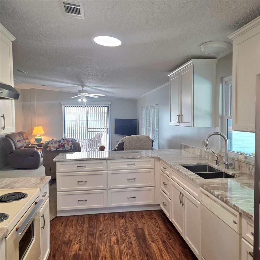 Photo of 6114 Grand Oaks Drive SE, Winter Haven, FL 33884 (MLS # L4961323)