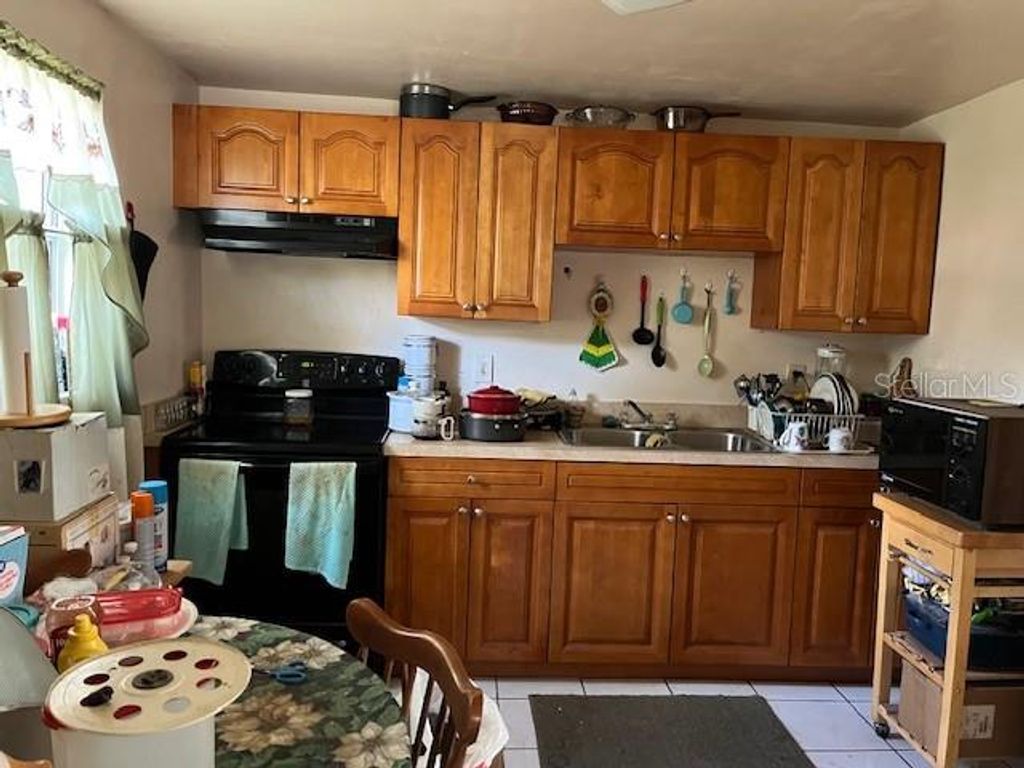 Photo of 1712 E River Cove Street, Tampa, FL 33604 (MLS # TB8481202)